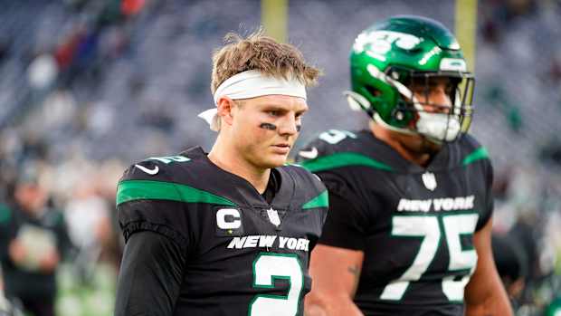 Jets QB Zach Wilson walks off field
